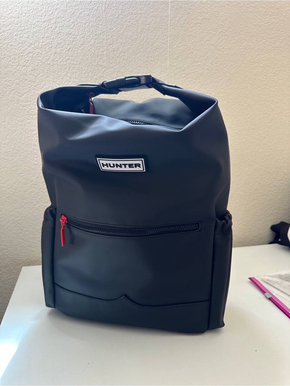 Hunter Black Roll-Top Backpack with Red Accents